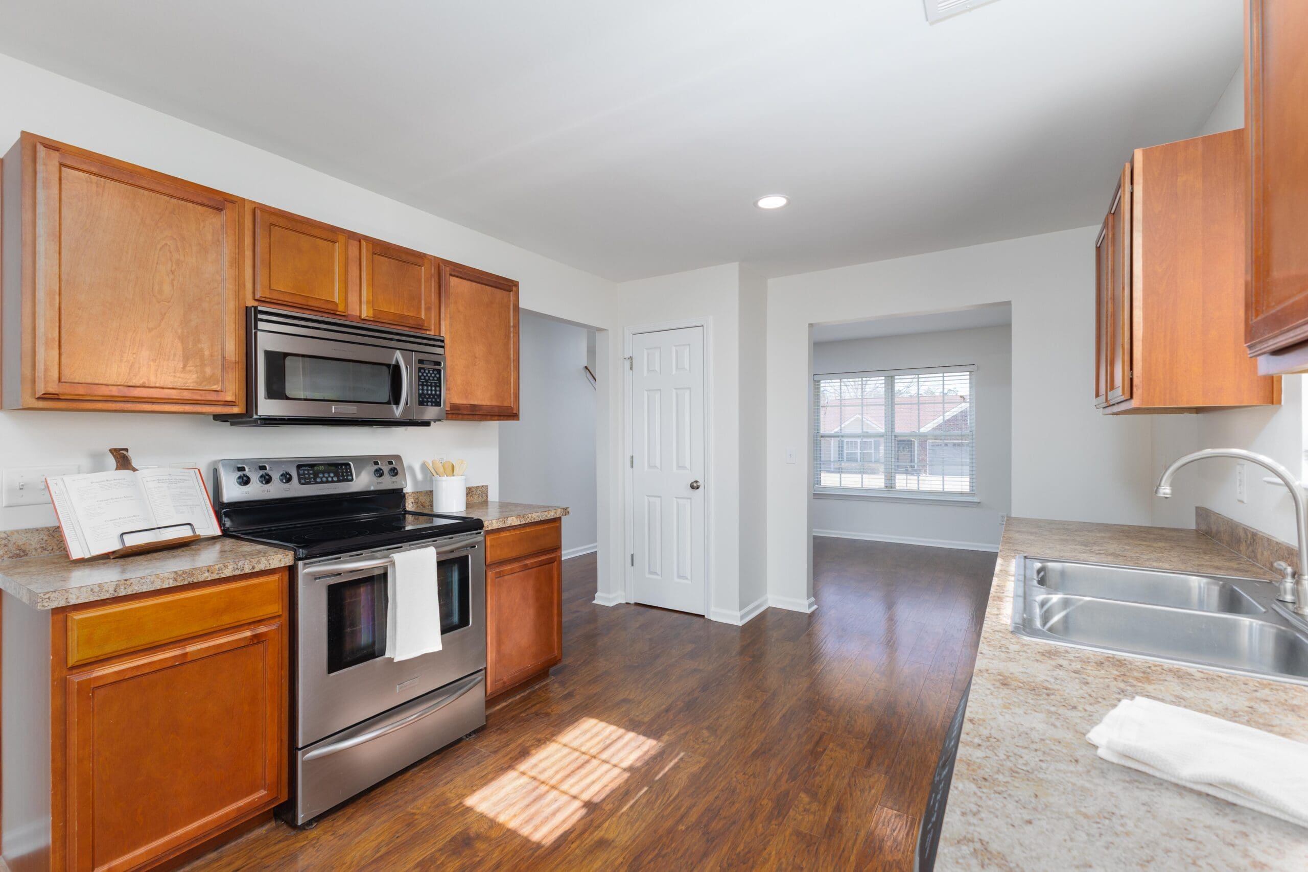 Updated Kitchen with stained cabnietry and stainless steel applainces at 116 Windy Hollow Dr Lexington SC