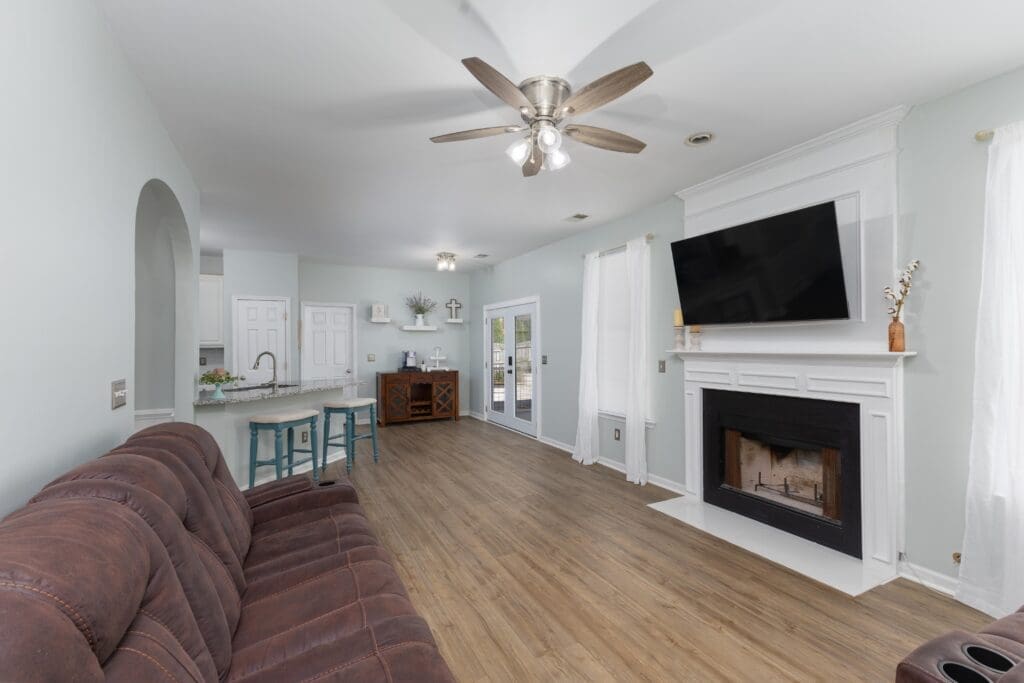 400 Buckthorne Dr Great Room Interior Photo With Wood Burning Fireplace